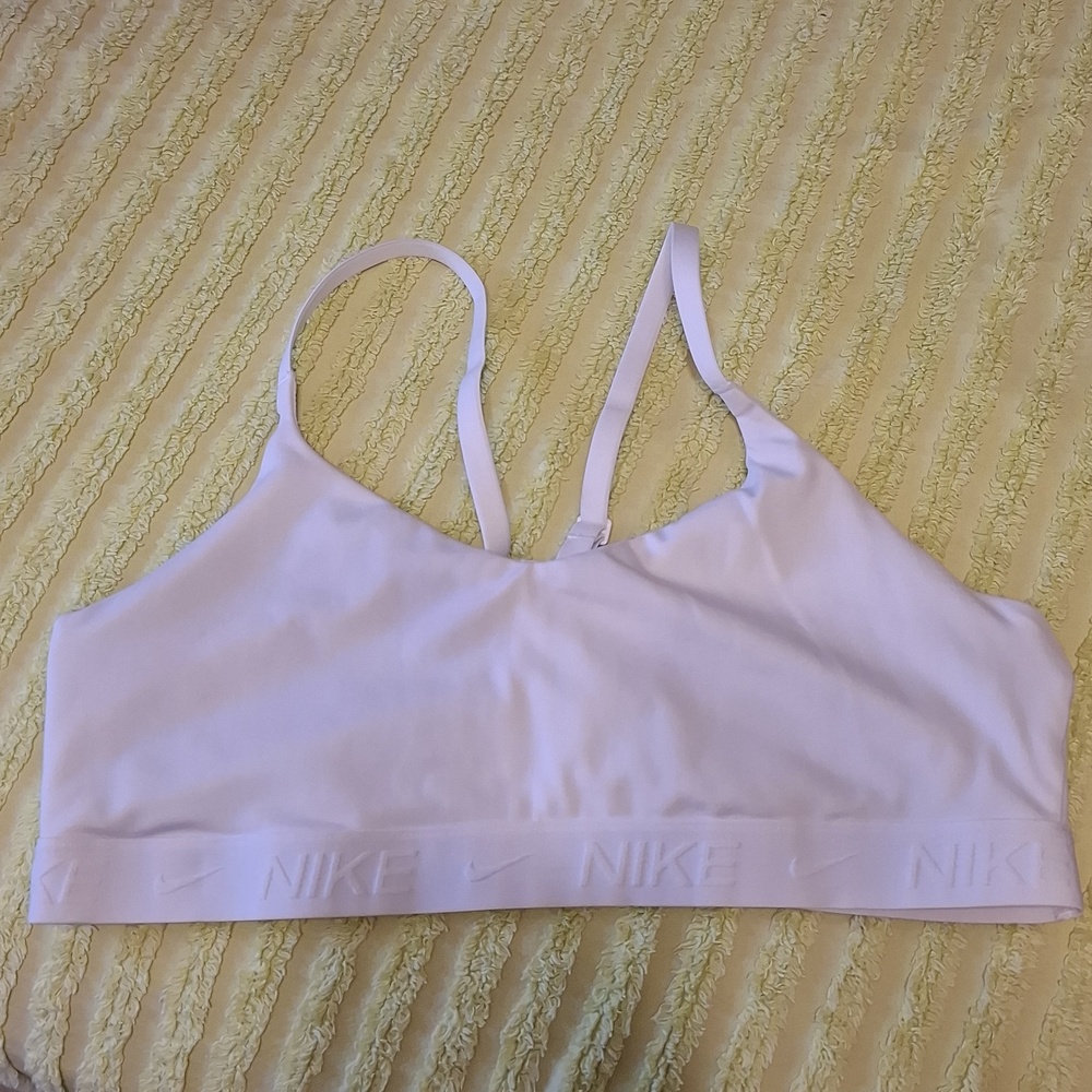 NIKE sz XL, (fits more like a large) Indy Dri-Fit, light support, crisscross bra